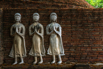 Obraz premium Ancient buddha figures in (SRI SUKHOT) temple is an ancient buddhist temple in Chan Palace is a Buddhist temple It is a major tourist attraction in Phitsanulok,Thailand.