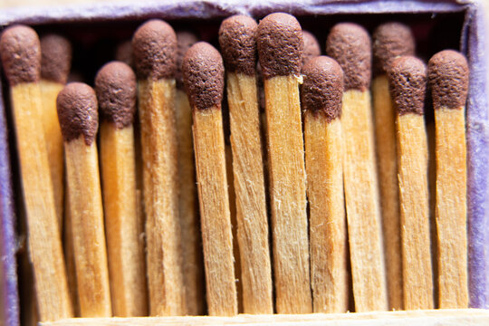 Old matches in a box close up, match