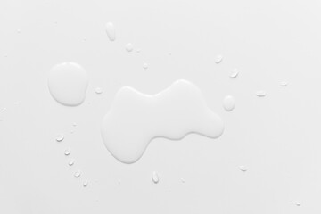 .Water spilled on a white table - Image