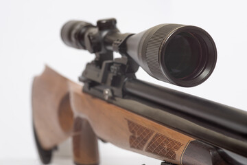 A long range airgun with bipods and optical sight on white background with bipods and optical sight on white 