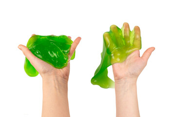Green and red slime toy in woman hand isolated on white.