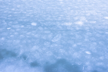 Natural texture of ice, frozen lake  as  background.