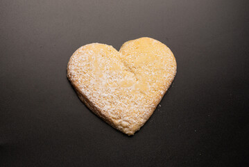 Shortbread in the shape of a heart isolated on white background.