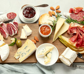 Cheese assortment on light background.