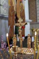Crucifix and candles in an Orthodox church