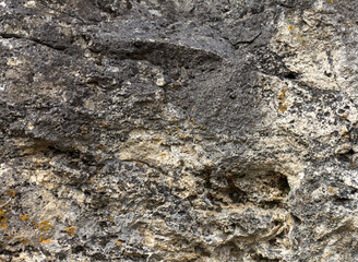 Natural mountain stone, the texture of the site, the walls of a stone canyon in a mountainous area.*