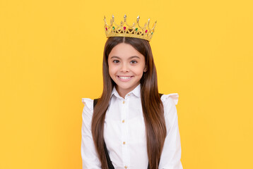 cheerful selfish child in school uniform wear princess crown, egoist