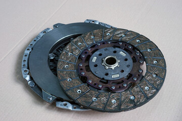 Details of the clutch system of a modern car. Close-up of the clutch disc and basket. Selected...