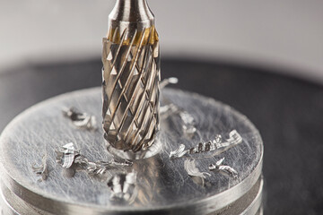 Milling сutter and drill bit make sink in hole in steel billet. Locksmith work.