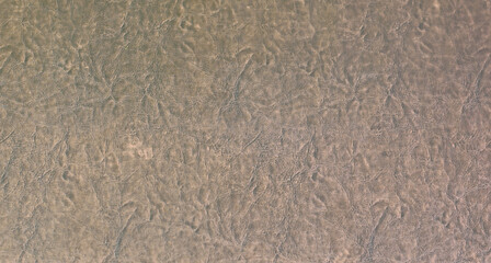 old wrinkled brown upholstery leather