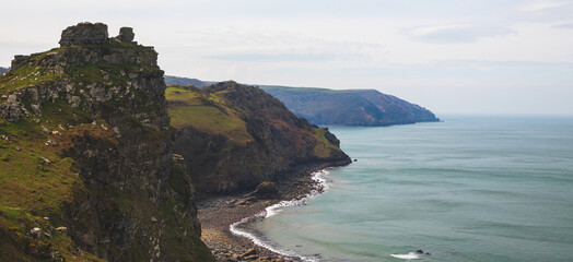 Fototapeta na wymiar Panoramic view of the cliffs by the ocean. Rocky sea coast