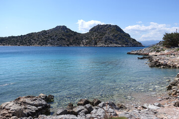 Fototapeta na wymiar Paradise bay and small port with turquoise beach of Aponisos in island of Agistri, Saronic Gulf, Greece