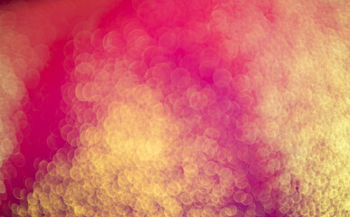 abstract pink and red bokeh background.
