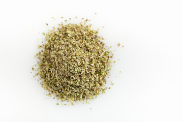 Heap of dried oregano. Isolated on white background. Top view. Copy space.