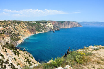 Obraz premium Azure water, wild beach, beautiful rocks and bay near Grape cape. Cape Fiolent, Sevastopol, Crimea