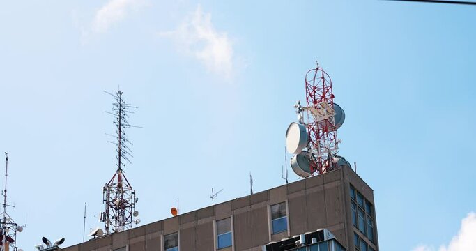 large antennas for transmitting radio signals in a populated city