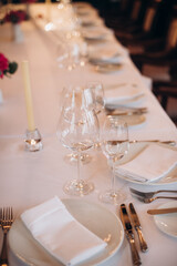 shining glasses in the wedding festive table setting side view