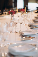 shining glasses in the wedding festive table setting side view
