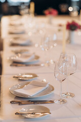 shining glasses in the wedding festive table setting side view