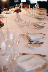 shining glasses in the wedding festive table setting side view