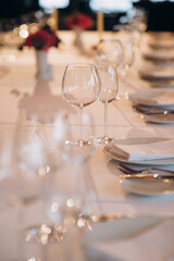 shining glasses in the wedding festive table setting side view