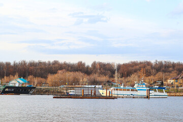 white boat on the pier