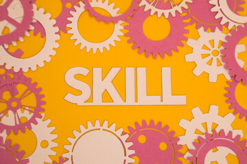 Paper inscription on the background of paper gears