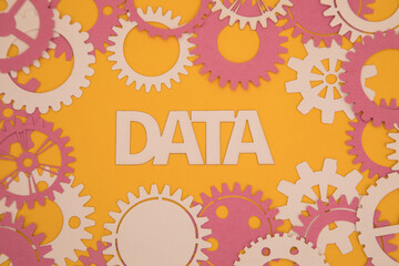 Paper inscription on the background of paper gears