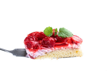 Slice of delicious strawberry tart on wooden background
