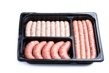 Set of pork sausages in plastic pack isolated on white background