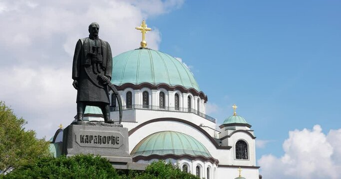 monument and church in the background by day in timelapse