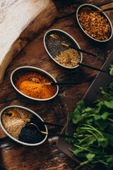 food ingredients, spices and herbs on a wooden table