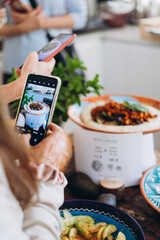 person make photo a plate with food