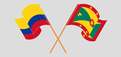 Crossed and waving flags of Colombia and Grenada