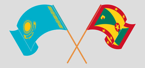 Crossed and waving flags of Kazakhstan and Grenada