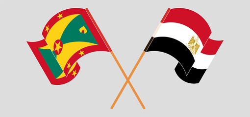 Crossed and waving flags of Grenada and Egypt