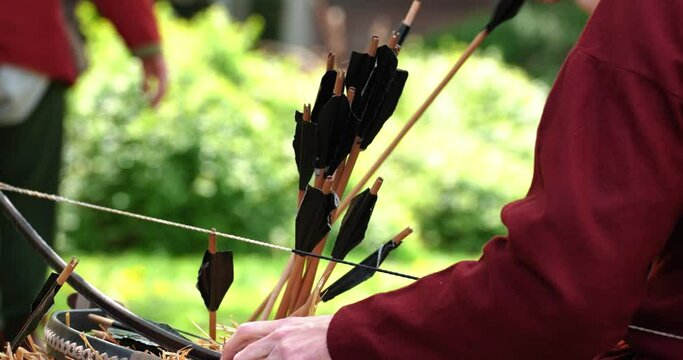 setting bows and arrows before shooting