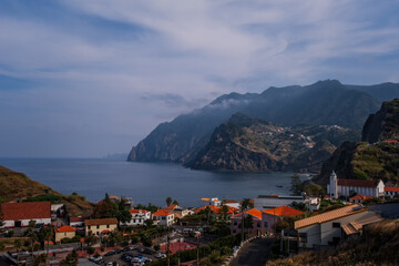 Fototapeta na wymiar PORTO DA CRUZ, PORTUGAL - October 2021: Madeira island coast at PORTO DA CRUZ, PORTUGAL. View from Miradouro do Porto da Cruz.