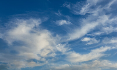 Fluffy Clouds against a vibrant blue Sky during Spring, Braga, Portugal.