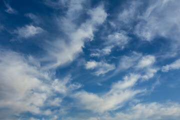 Fluffy Clouds against a vibrant blue Sky during Spring, Braga, Portugal.