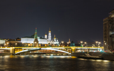 Fototapeta na wymiar Moscow, Russia. April. Classical poscard view of the Moscow Kremlin and Bolshoy Kamenny bridge. Night
