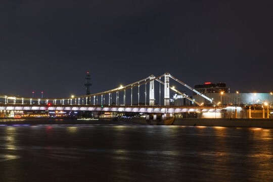 Moscow, Russia. Night view of Krymsky bridge over Mosow river. Shot from Frunzenskaya embankment. April
