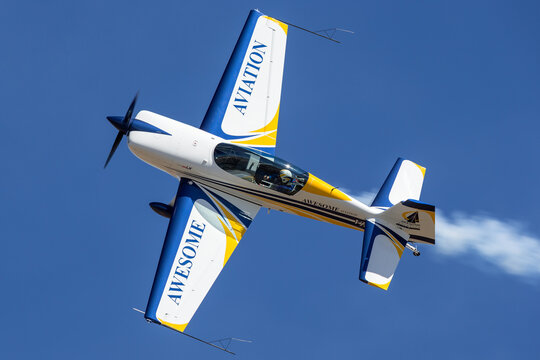 Avalon, Australia - March 3, 2013: British aerobatic pilot Mark Jefferies flying a single engine Extra 330LX aerobatic aircraft VH-IXN.