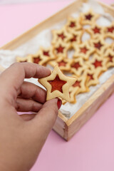 Star shaped linzer cookie strawberry jam
