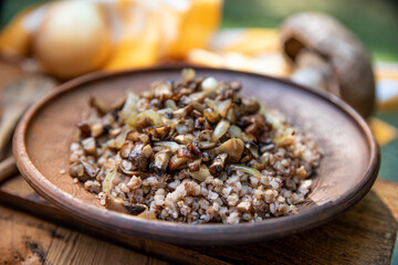 buckwheat with fried mushrooms on a plate