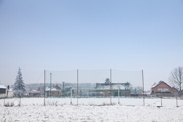 Selective blur on neglected and abandoned Soccer goals with football nets on display on a...