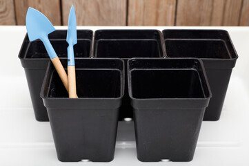 cultivaron tools ,pots for planting,  with a white background.wooden