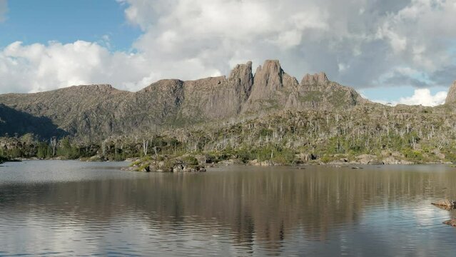 a zoom in on mt geryon and lake elysia during a summer afternoon at the labyrinth in cradle mountain-lake st clair national park of tasmania, australia