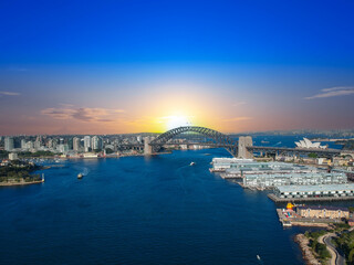 Sydney Harbour Australia with nice colours in the sky. Nice blue water of the Harbour, high rise offices and residential buildings of the City in the background, NSW Australia