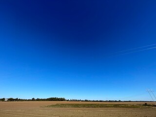 Fototapeta premium Fields Nature and clear blue sky wide view